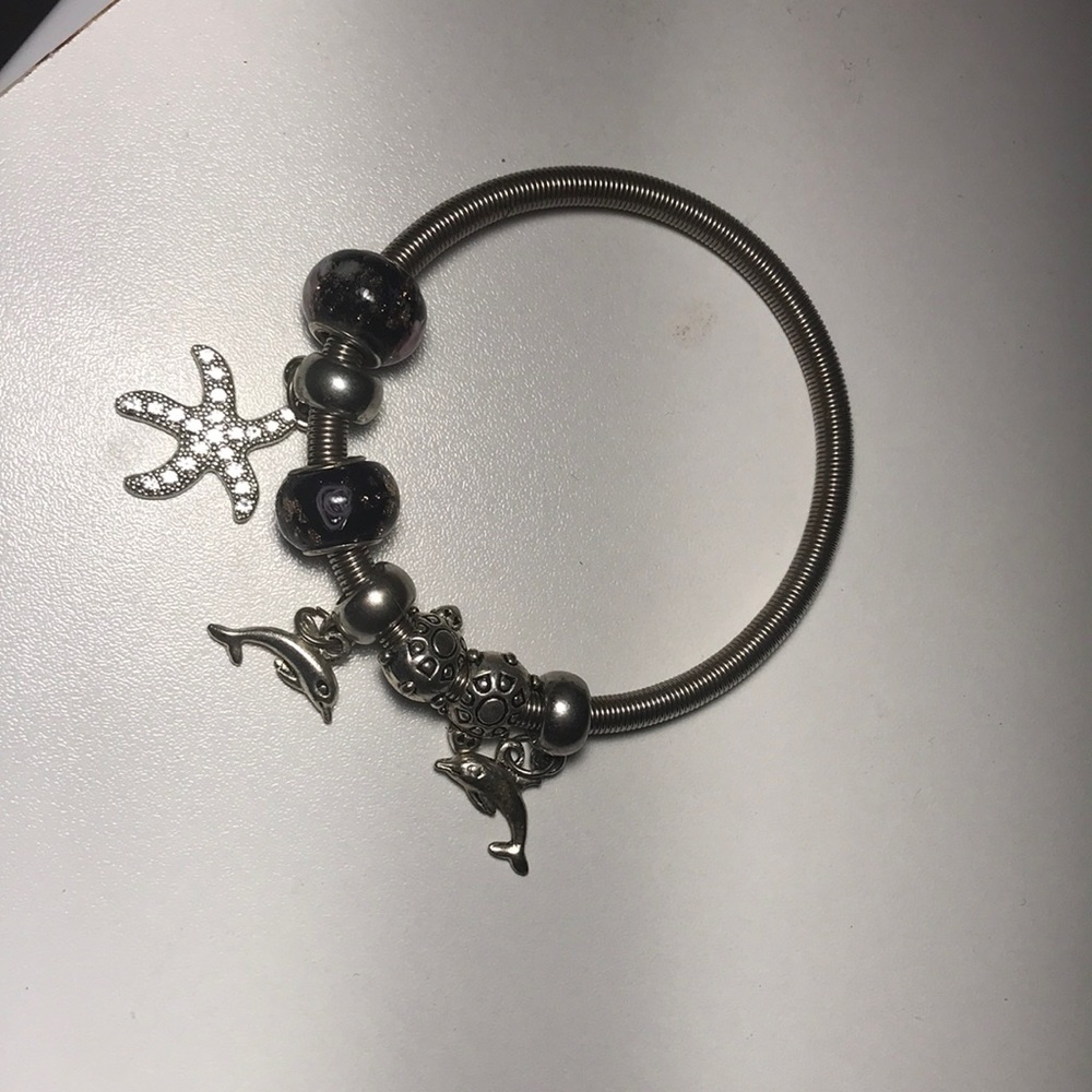 Sterling silver charm bracelet. Beautifully hand made myself ,Very durable band